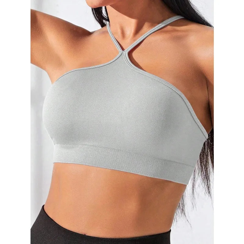 Top sportivo senza cuciture slim fit incrociato
