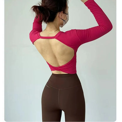 Top Sportivo Corto a Maniche Lunghe con Schiena Scoperta