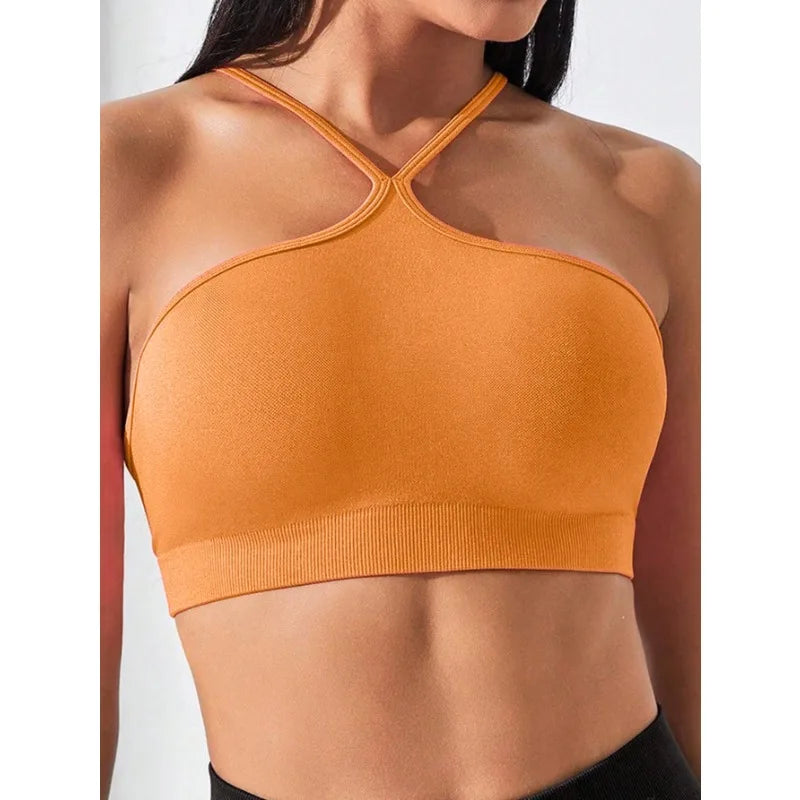 Top sportivo senza cuciture slim fit incrociato
