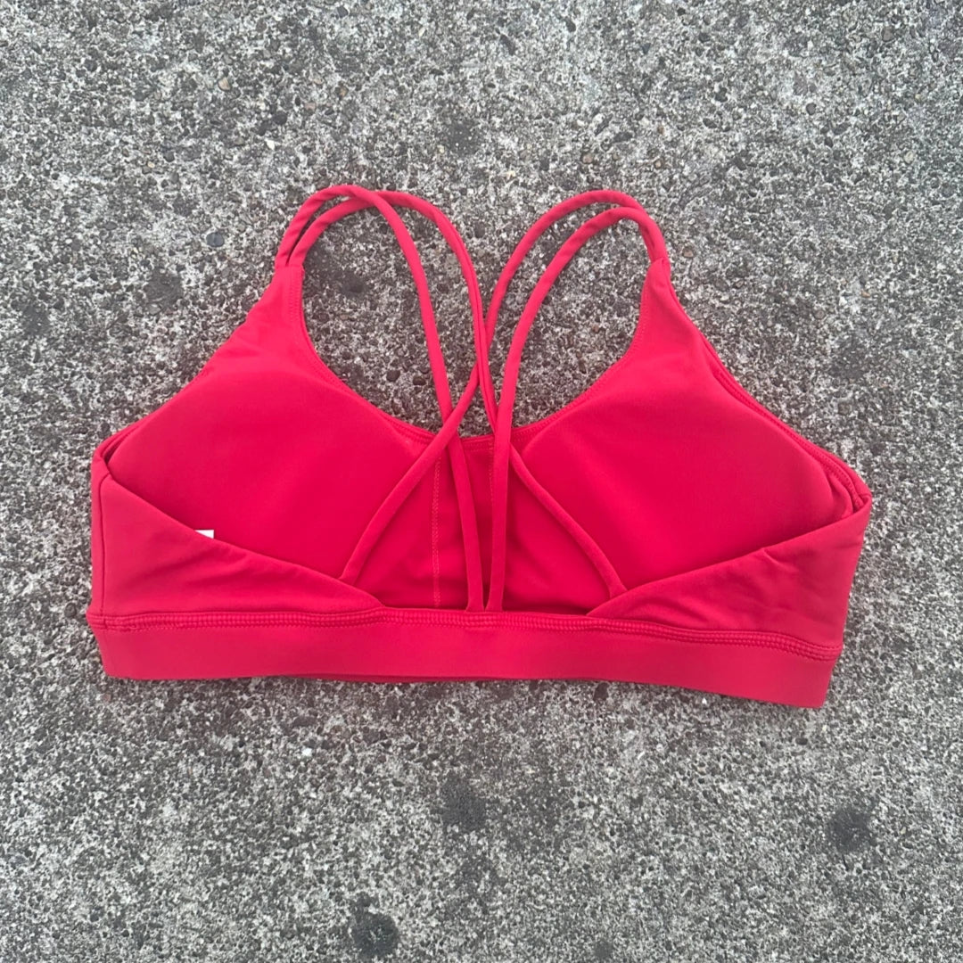 Reggiseno sportivo incrociato con imbottitura