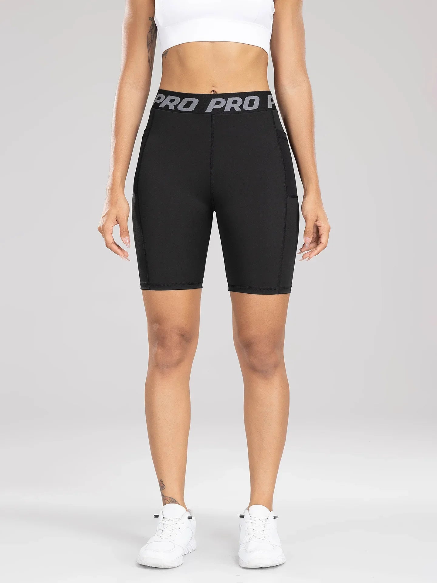 Pantaloncini fitness da donna push-up con tasca laterale