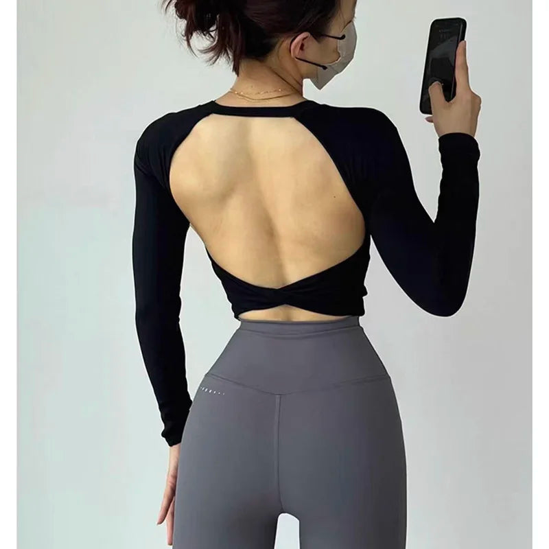 Top Sportivo Corto a Maniche Lunghe con Schiena Scoperta