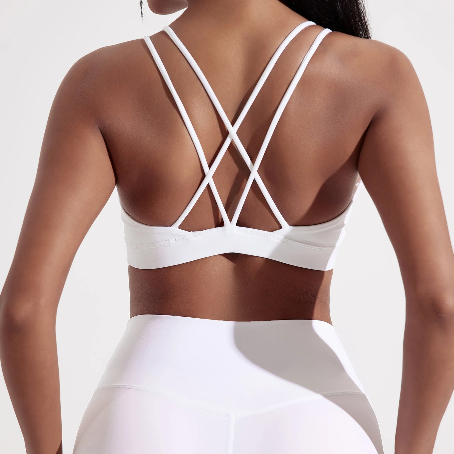 Reggiseno sportivo incrociato con imbottitura
